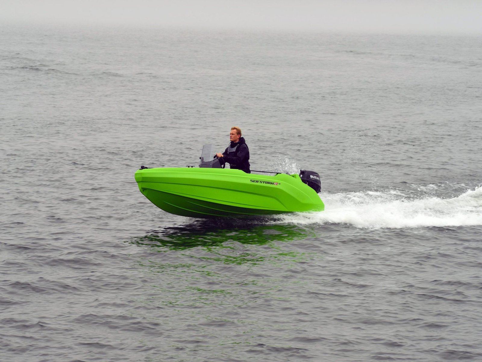 SeaStorm 12 in lime green, underway