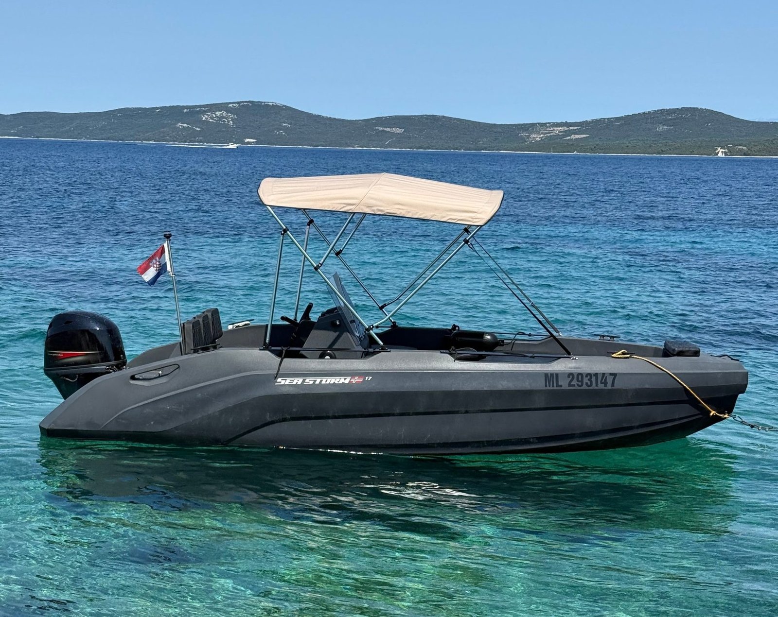 Dark grey SeaStorm 17 in clear water